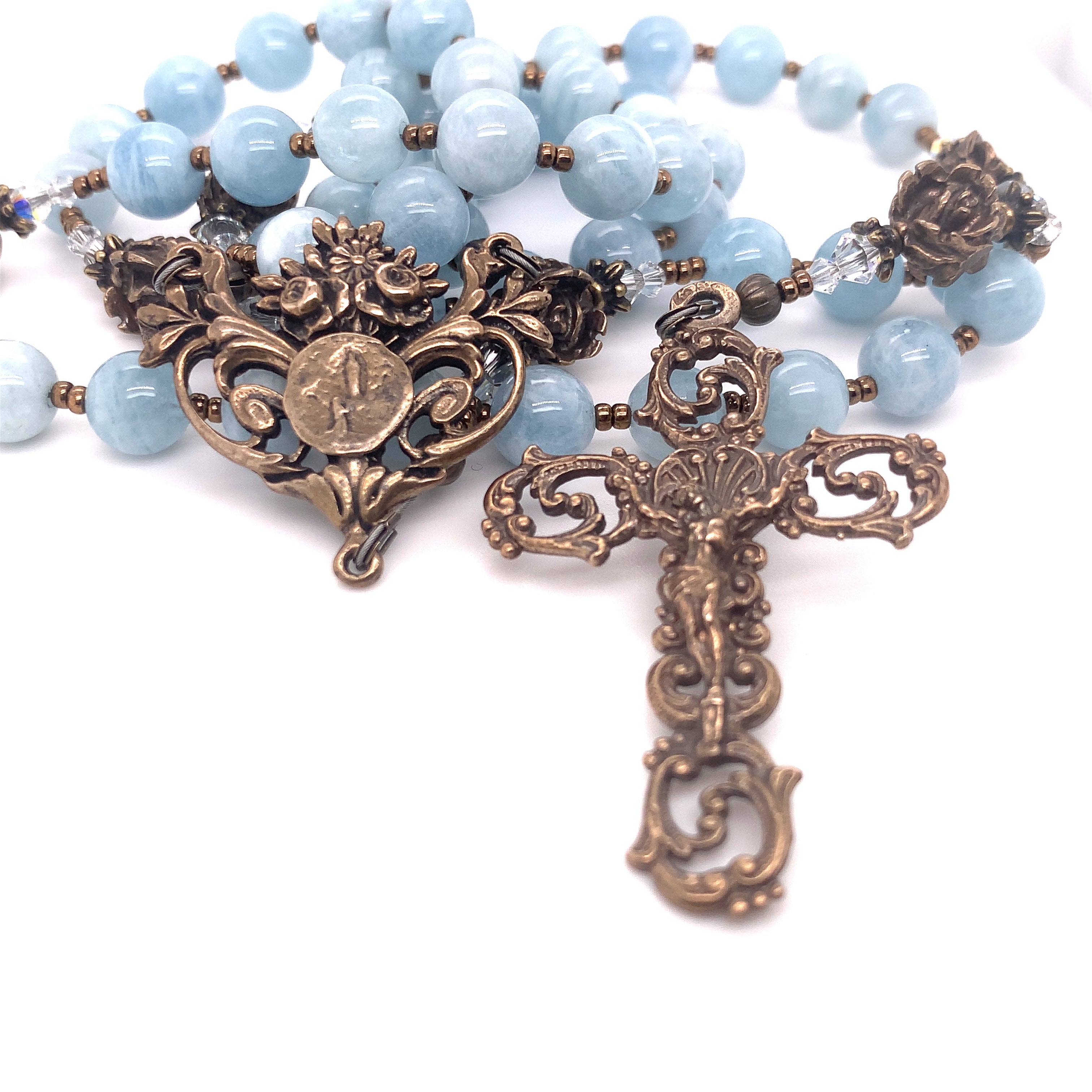 Aquamarine and Bronze Lourdes Center and Elaborate Scrolls Crucifix