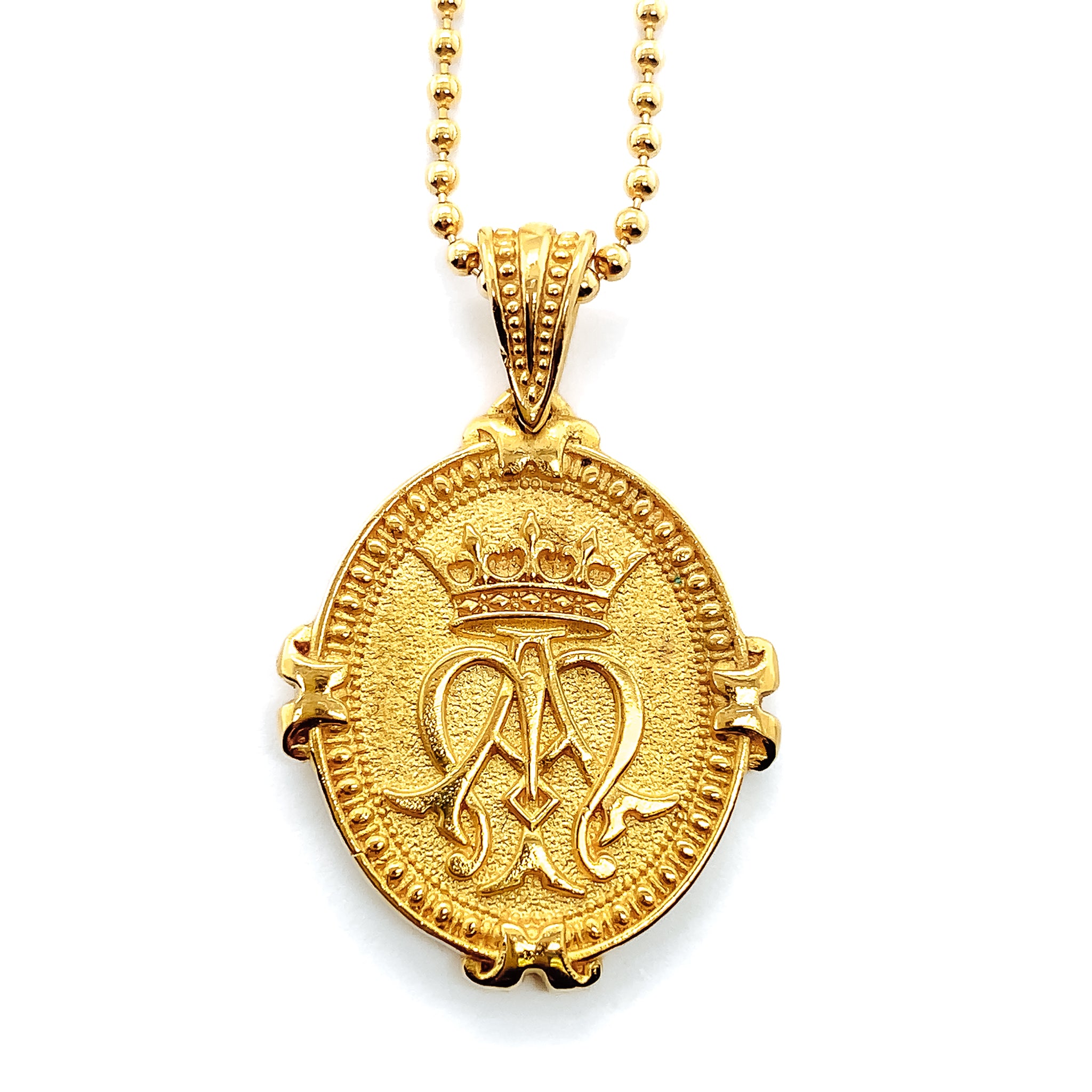 Gold pendant hanging on bead chain showing auspice maria emblem with crown over A and M. Sometimes referred to as Ave Maria Necklace.
