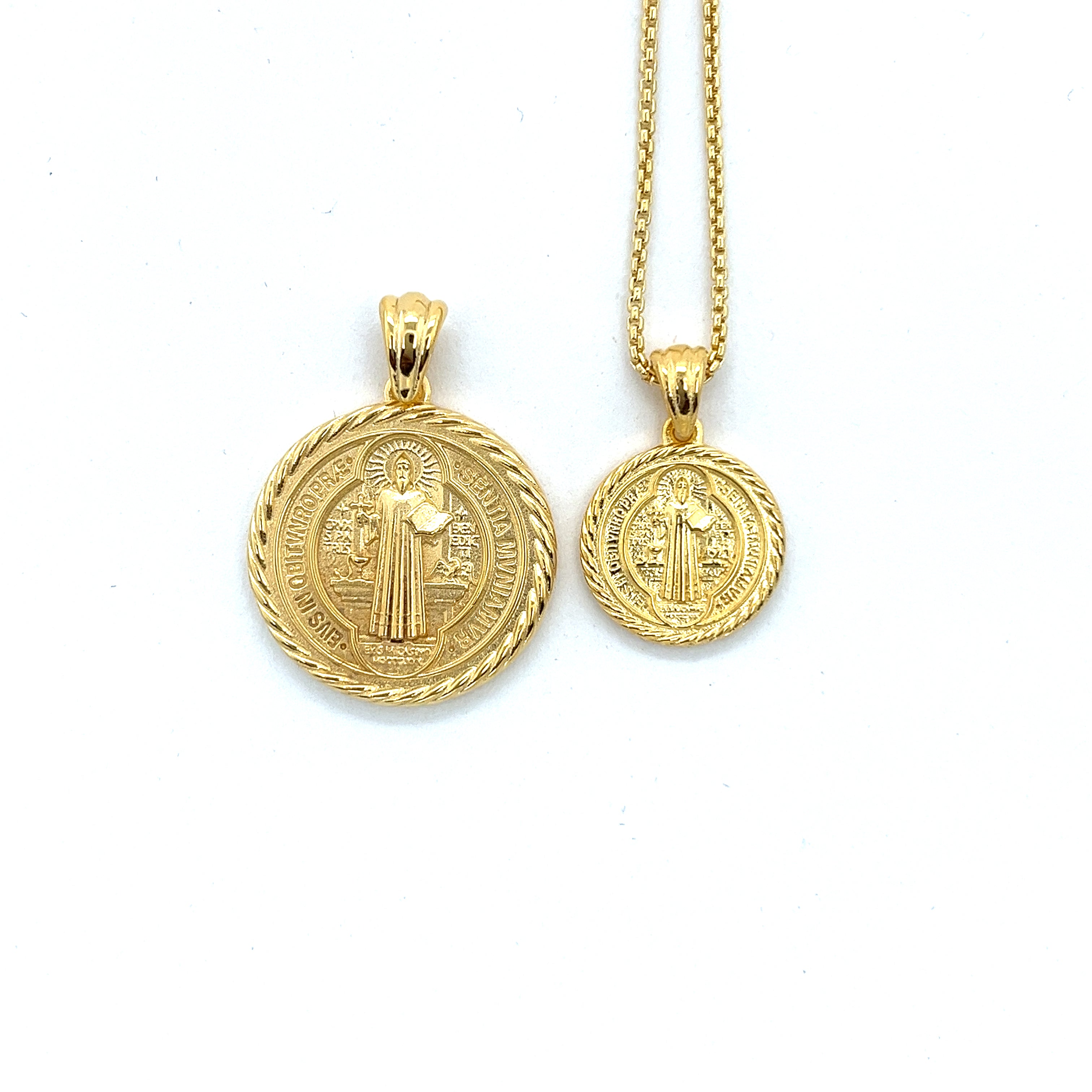 two st benedict necklace pendants in 14 karat gold vermeil of different sizes