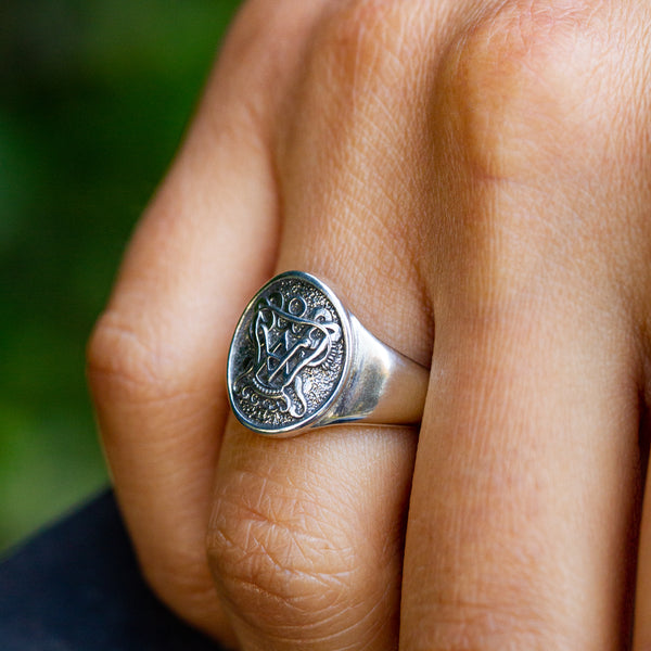 Auspice Maria Silver Ring in Silver shown on ring finger