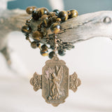 Bronze St Michael medal on the end of a chaplet with tiger eye beads