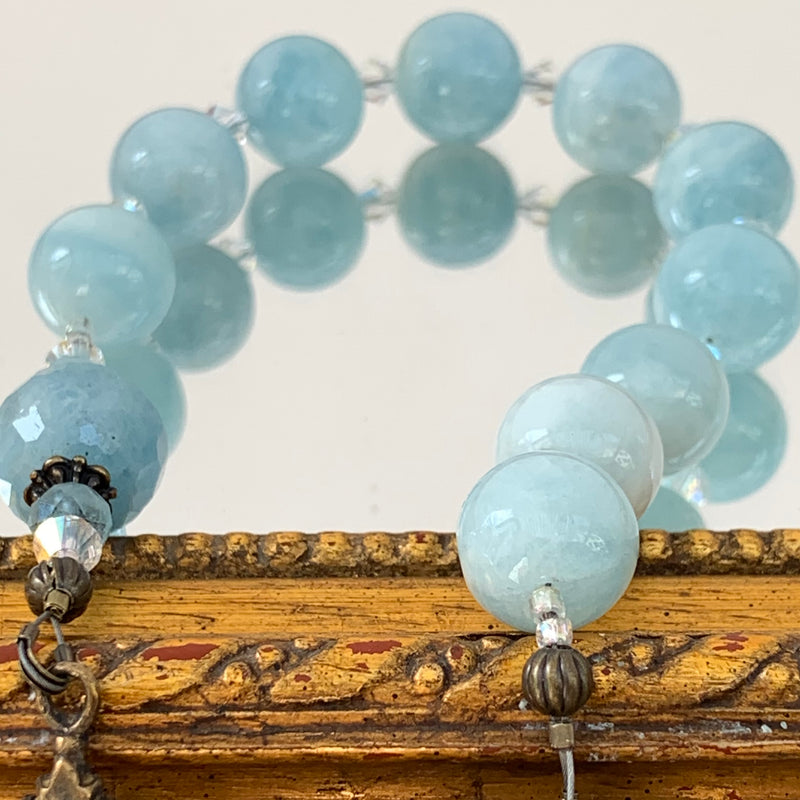 Light blue aquamarine beads on single decade rosary.
