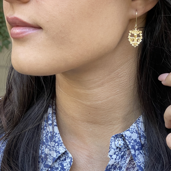Openwork gold fleur de lis earrings make beautiful catholic jewelry