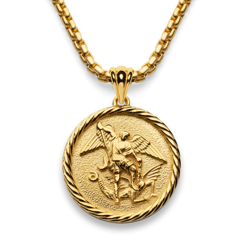 Gold Necklace pendant hanging from a gold chain showing St Michael with his sword poised and his foot holding a demon down.  The pendant has a rope like boder around the edge.