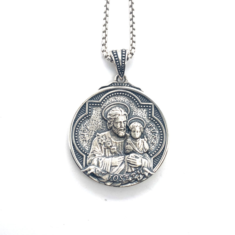Sterling silver Pendant Saint Joseph with Jesus and on reverse, the three hearts of Jesus, Mary and Joseph 