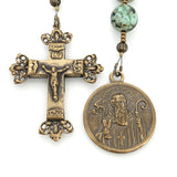 Bronze St Benedict Medal and bronze ornate crucifix along with african jaspar bead