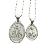 Oval shaped sterling silver necklace pendant of Mary's crown representing her position as Queen of Heaven.  Scripted M for Mary.