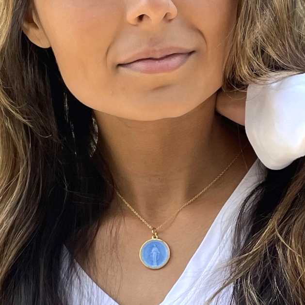 Beautiful french blue enamel miraculous medal pendant necklace on brunette model