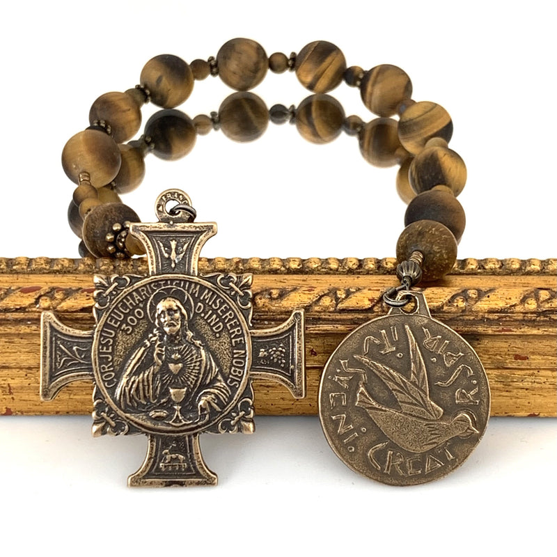 single-decade-rosary-with-natural-tiger-eye-rosary-beads-and-bronze-Sacred-heart-cross-with-holy-spirit-bronze-medal