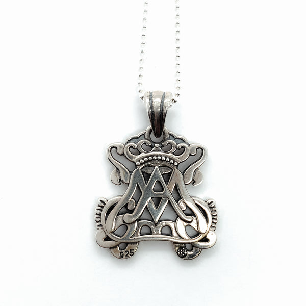 Sterling Silver openwork Auspice Maria necklace pendant hanging on a silver bead chain